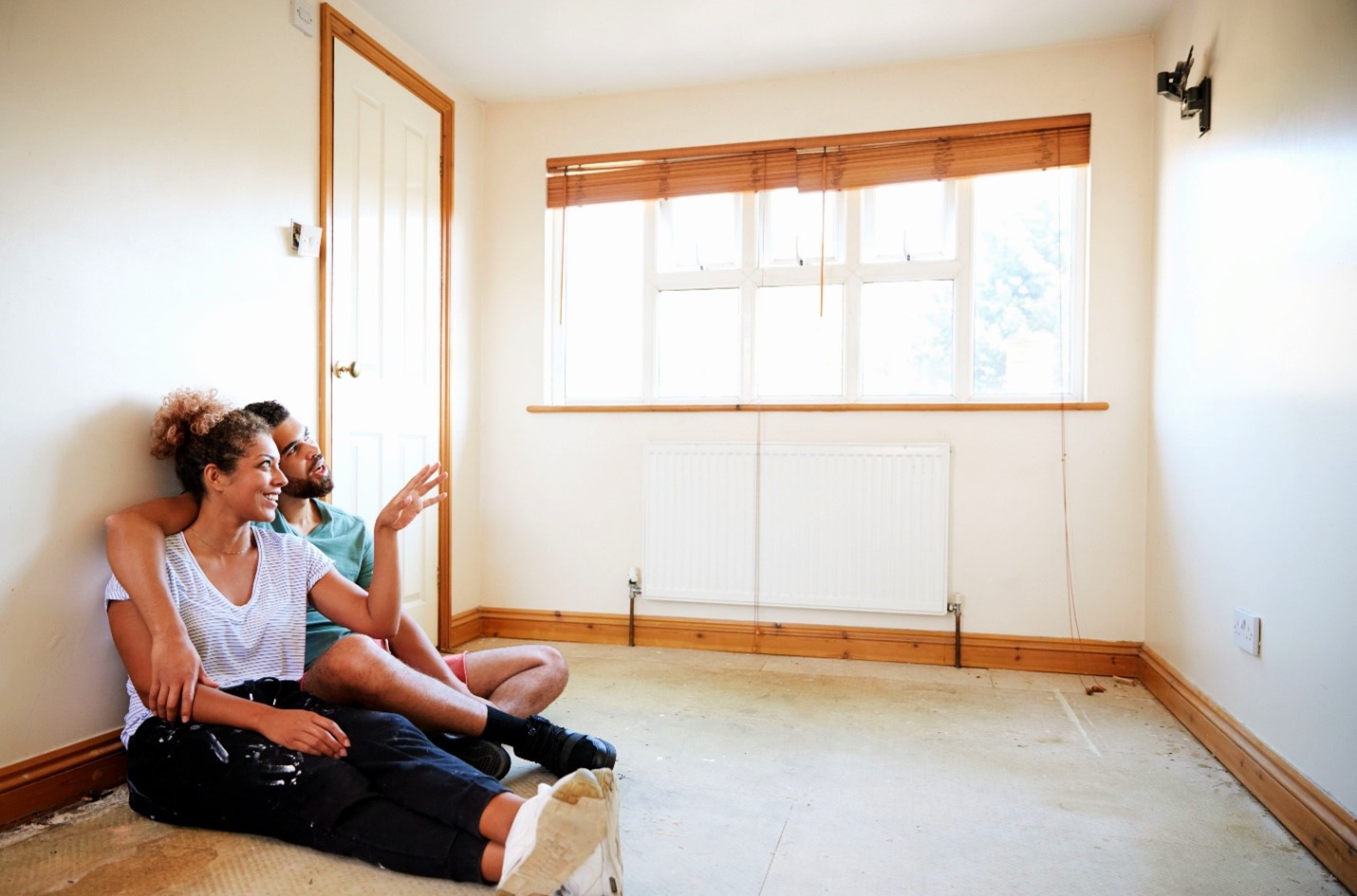 A couple dreaming of their renovated space.